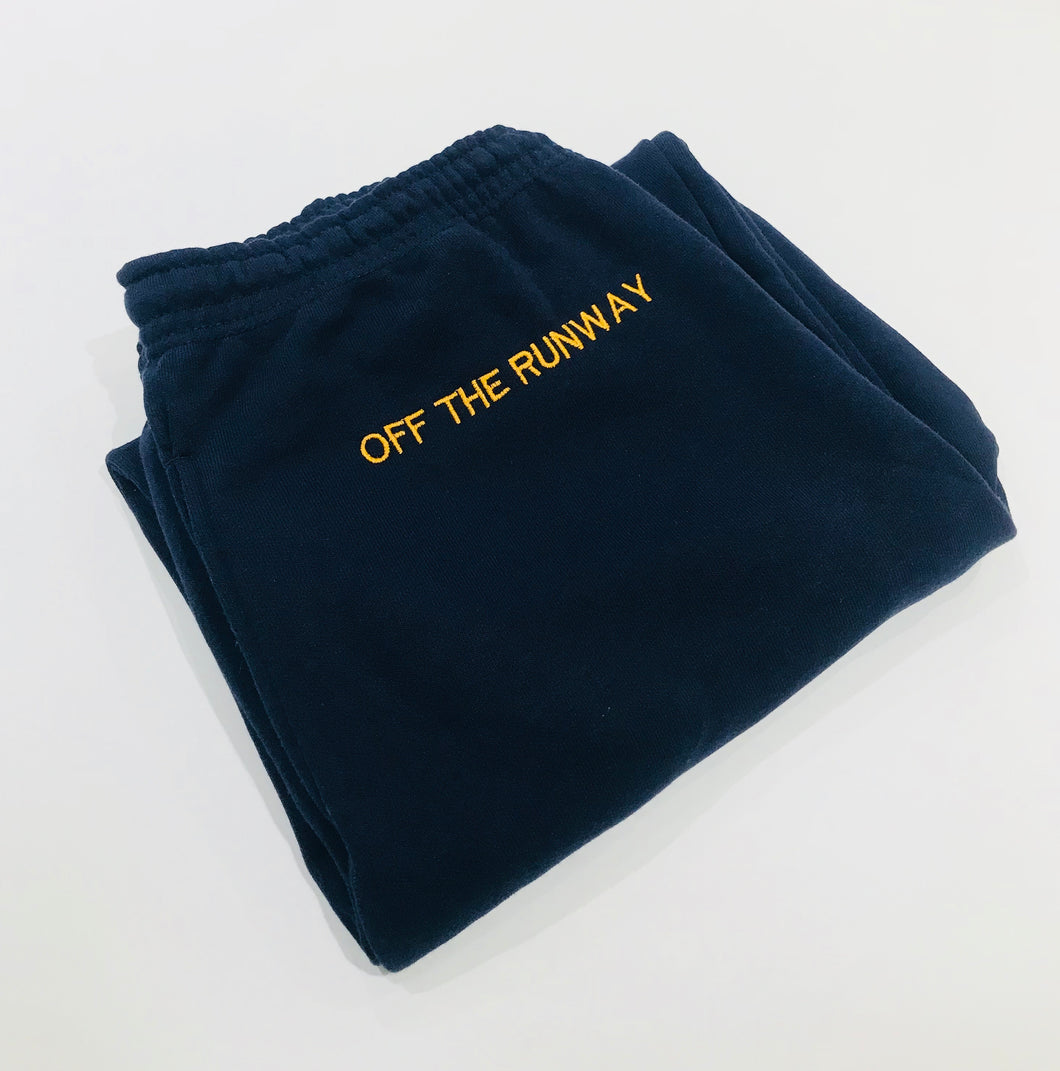 (OLD LOGO) Navy joggers. Gold logo.
